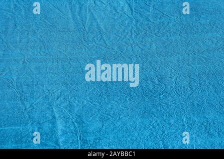 Texture of blue shantung silk fabric closeup as textile background Stock Photo