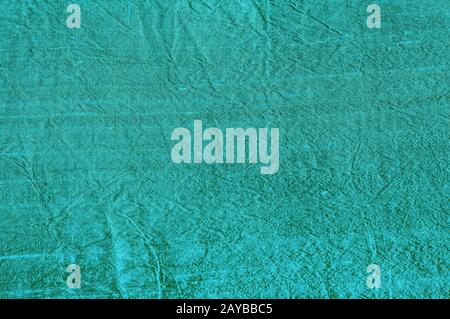 Texture of turquoise shantung silk fabric closeup as textile background Stock Photo