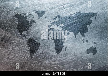 grunge map of the world over brushed metal texture Stock Photo