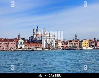 a view of venice from the sea showing the zattere salute area with the church of santa maria del rosario and waterfront landmark Stock Photo