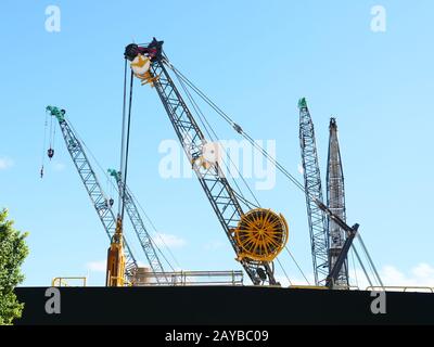 Unusual construction crane seen in the harbour area of Perth Australia on a construction site. Stock Photo