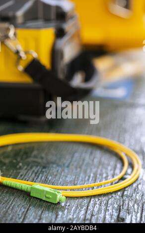 Device for mounting optical cable. Optical internet Technology concept. Stock Photo