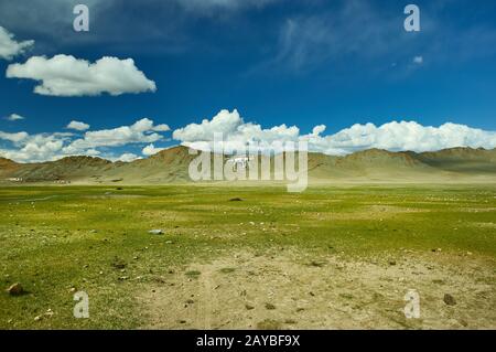 Mongolian Altai.  Scenic valley on the background of the snowcapped mountains. Stock Photo