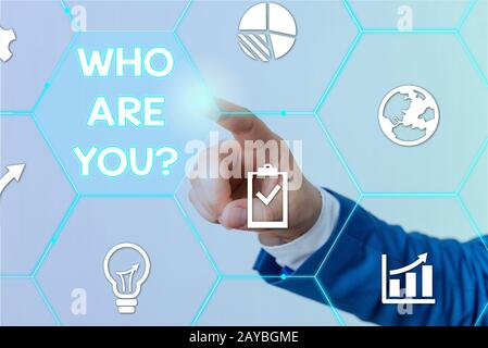 Text sign showing Who Are You question. Conceptual photo asking demonstrating identity or demonstratingal information. Stock Photo