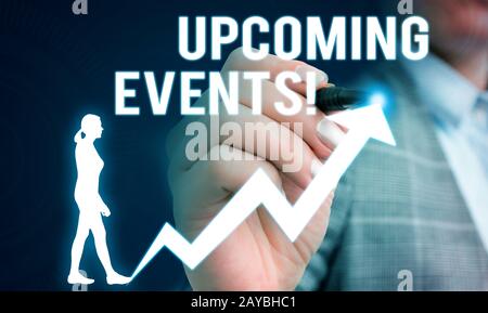 Handwriting text writing Upcoming Events. Concept meaning thing that will happens or takes place soon planned occasion Female hu Stock Photo