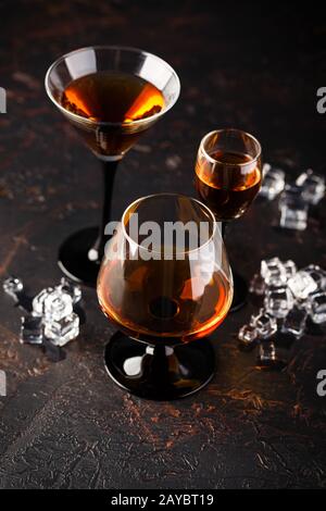Set of strong alcoholic drinks in glasses Stock Photo