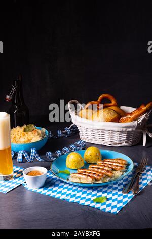 thuringian bratwurst with sauerkraut and dumplings Stock Photo