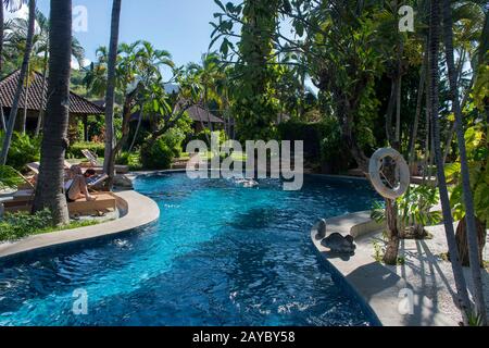 The swimming pool at Coral View Villas Hotel situated in Lipah bay, Amed, East Bali, Indonesia. Stock Photo