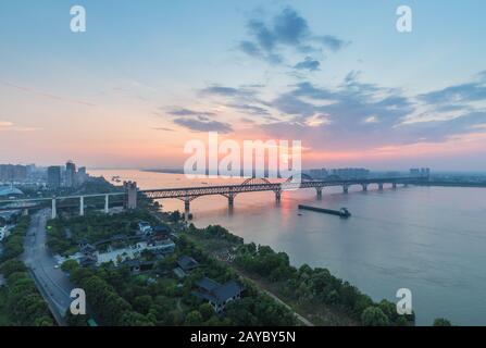 jiujiang yangtze river bridge at dusk Stock Photo