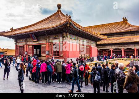 Crowd of tourists visiting Forbidden City, front view on temples Stock Photo