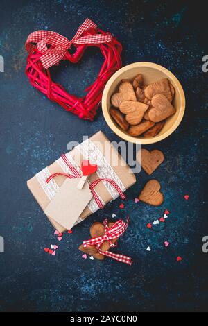 Gift box with and cookies in the shape of heart. Stock Photo