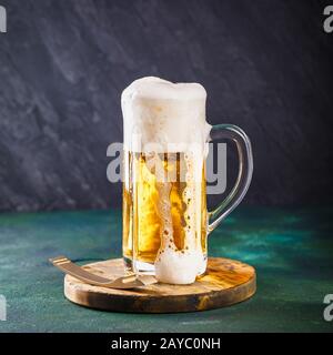 Mug of beer on dark background Stock Photo