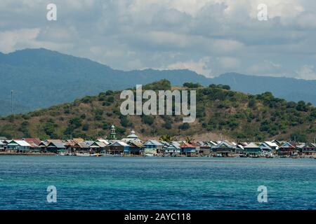 View of Bungin Island, off the coast of Sumbawa Island, Indonesia, home to a group of Bajau Sea Gypsies, famous for living in stilt houses above the w Stock Photo