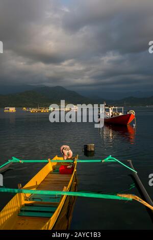 View of pearl farms in a bay at Bungin Island, off the coast of Sumbawa Island, Indonesia, home to a group of Bajau Sea Gypsies, famous for living in Stock Photo