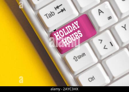 Conceptual hand writing showing Holiday Hours. Business photo text employee receives twice their normal pay for all hours White Stock Photo