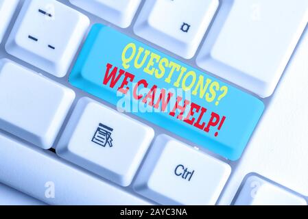 Text sign showing Questionsquestion We Can Help. Conceptual photo offering help to those who wants to know White pc keyboard wit Stock Photo