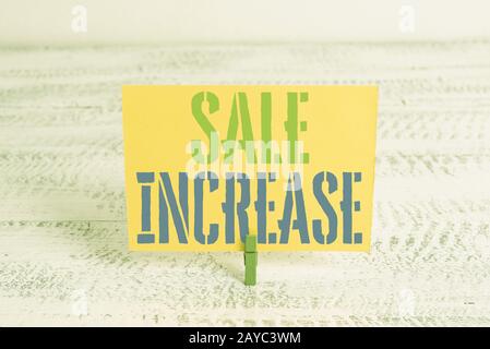 Text sign showing Sale Increase. Conceptual photo Average Sales Volume has Grown Boost Income from Leads Green clothespin white Stock Photo