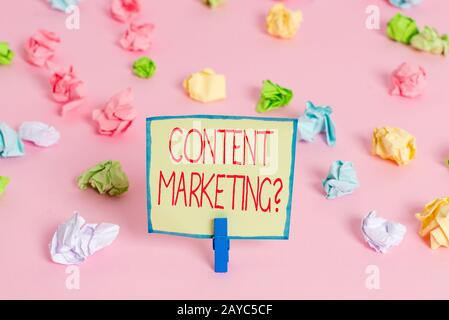 Text sign showing Content Marketing Question. Conceptual photo involves creation and sharing of online material Colored crumpled Stock Photo