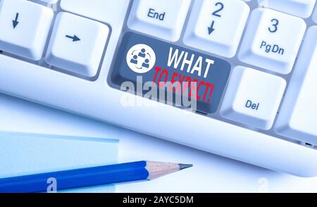 Handwriting text writing What To Expect. Concept meaning asking about regard something as likely to happen occur White pc keyboa Stock Photo