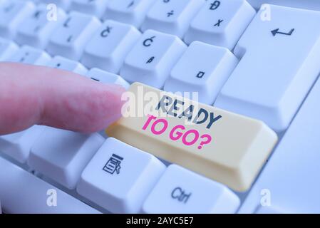 Writing note showing Ready To Go Question. Business photo showcasing asking someone if he is prepared or packed his things White Stock Photo