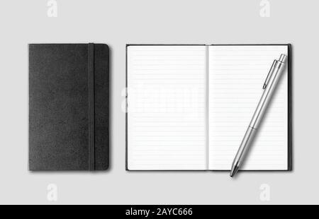 Black closed and open notebooks with pen isolated on grey Stock Photo