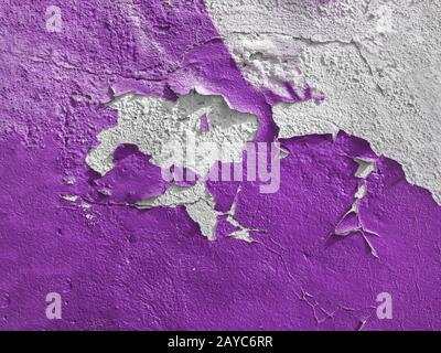 Violet wall with the peeled-off paint Stock Photo