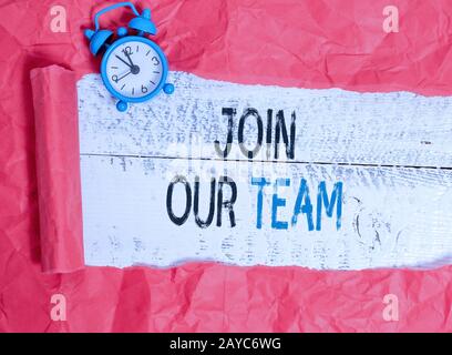 Writing note showing Join Our Team. Business photo showcasing inviting someone to join in your local group or company. Stock Photo