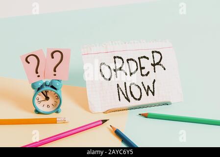 Handwriting text writing Order Now. Concept meaning the activity of asking for goods or services from a company. Stock Photo