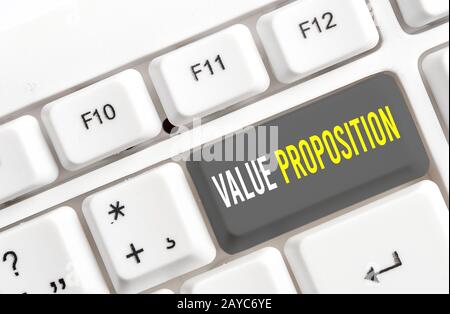 Writing note showing Value Proposition. Business photo showcasing feature intended to make a company or product attractive White Stock Photo