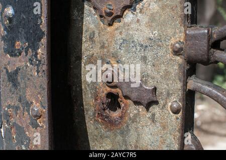 Old retro vintage iron door lock closeup Stock Photo