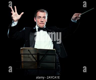 Shot of music director conducting with inspiration Stock Photo