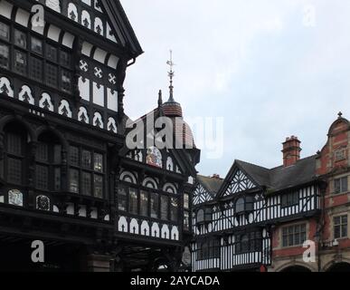 ornate old half timbered gabled buildings in the historic city center of chester