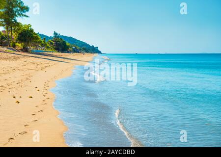 Landscape of tropical island with sand beach and blue sea Stock Photo