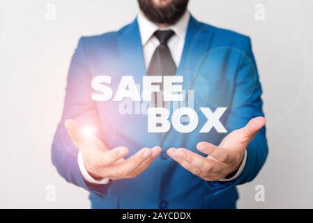 Text sign showing Safe Box. Conceptual photo A small structure where you can keep important or valuable things Man with opened h Stock Photo