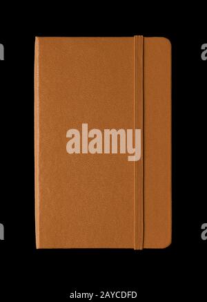 Leather closed notebook isolated on black Stock Photo