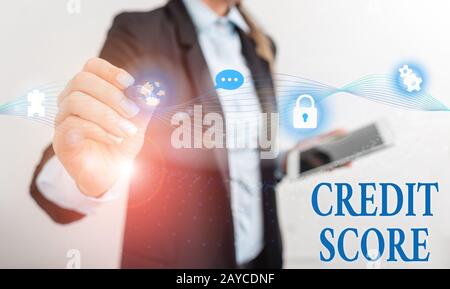 Handwriting text writing Credit Score. Concept meaning creditworthiness of an individual based on credit files Female human wear Stock Photo