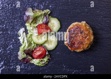Bavarian Kaspressknödel with salad Stock Photo