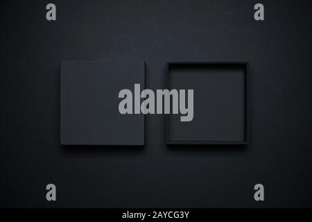 Black Boxes mockup  opened and closed display on black background Stock Photo