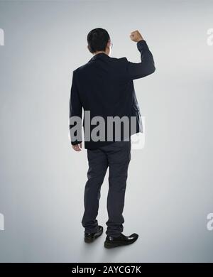 Excited businessman isolated on the white Stock Photo
