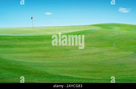 Beautiful perfect scenery view of Golf course green grass field . Stock Photo