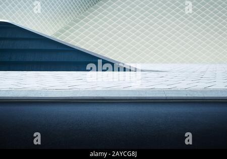 Abstract geometric structure blue and white wall and empty asphalt . Stock Photo