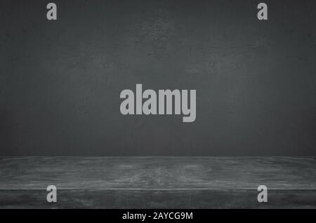 Empty grunge dark cement wall and table top background Stock Photo