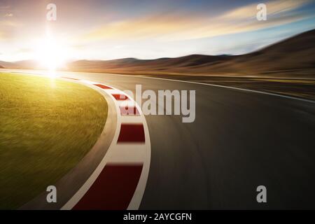 Motion blurred racetrack with mountain background Stock Photo