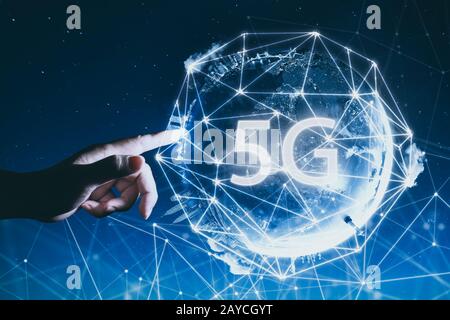 5G network wireless systems and internet of things with man touching Abstract global with wireless communication network on spac Stock Photo