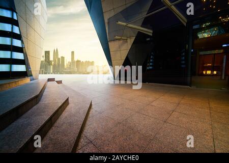 Empty marble stair and floor front of modern polygon design buildings. Stock Photo