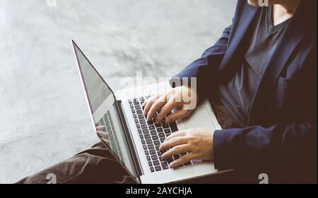Top angle and closeup view  of businessman using the laptop . Stock Photo