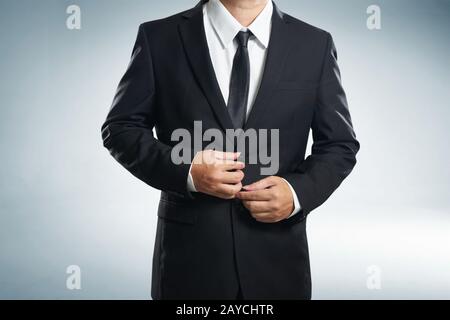 Confidence businessman in black suit Stock Photo