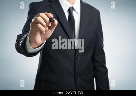 Businessman writing Stock Photo