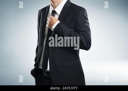 Confidence businessman in black suit Stock Photo