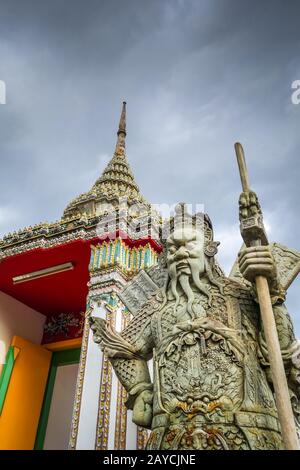 Chinese Guard statue in Wat Pho, Bangkok, Thailand Stock Photo